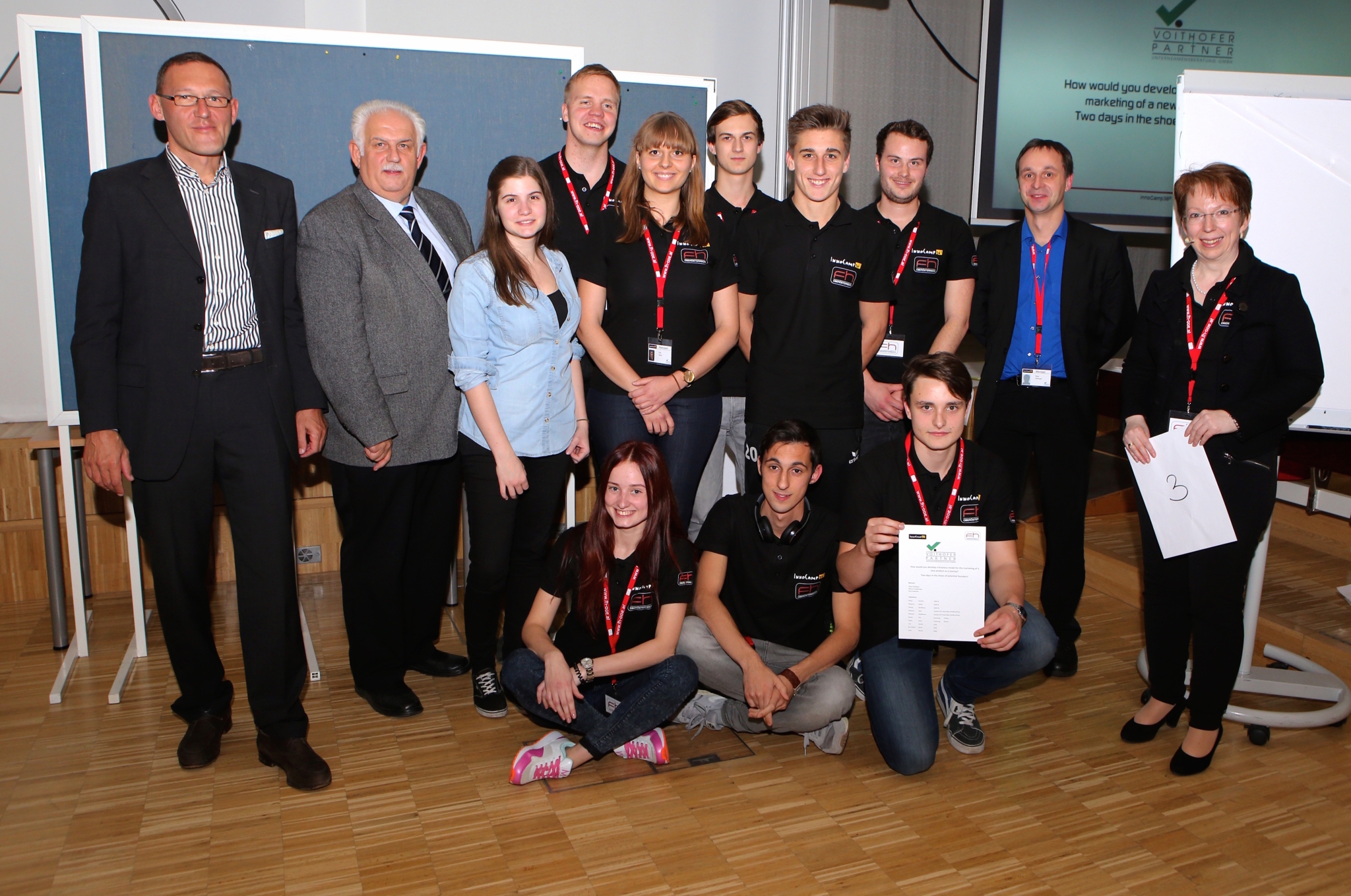 Group photo of the third-placed team at Innocamp36, all participants stand together and look into the camera