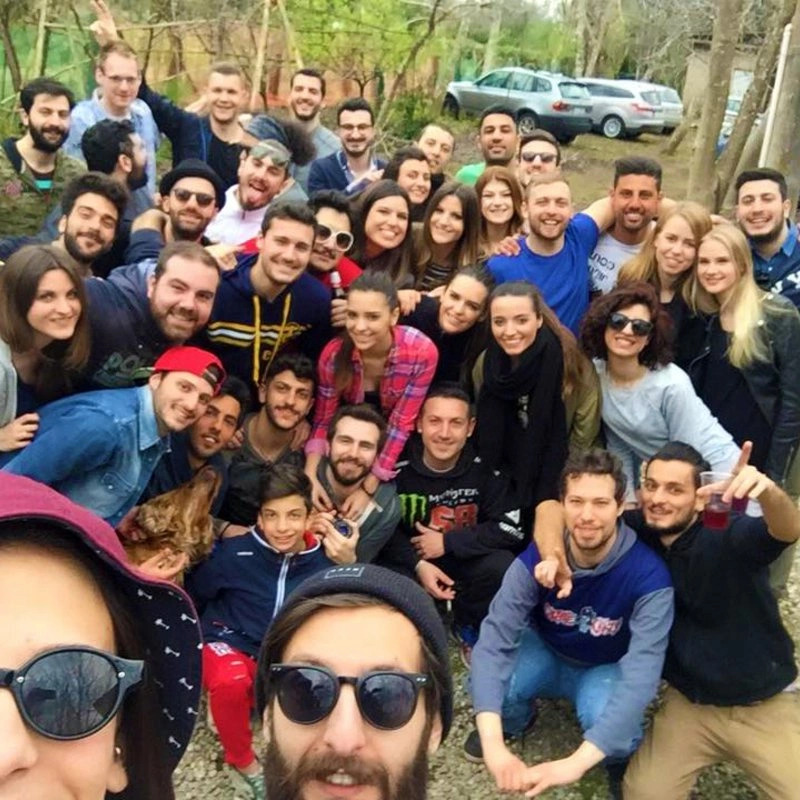 Exchange student Jan making a group selfie with fellow international students